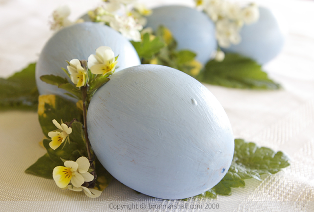 Blown Eggs Painted Blue Adorned with
Simple Wild Flowers and Herbs